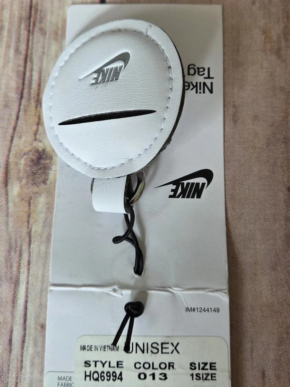 Nike Unisex Leather Circle Tag Fob with Silver Swoosh NWT